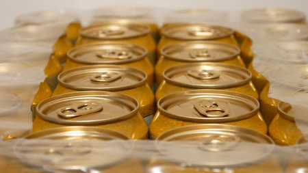 Close-up of many packaged beer cans