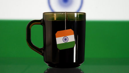 Close-up of a cup of tea with an Indian flag tag hanging from it