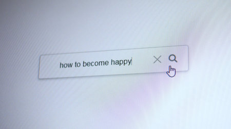 A search bar with the entering query How to become happy