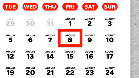 Close-up of the date August 8th marked with a red cursor on the wall calendar 2025の写真素材