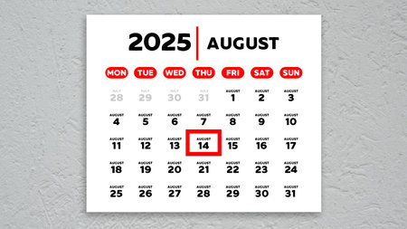 The date August 14th marked with a red cursor on the wall calendar 2025