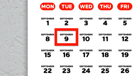Close-up of the date September 9th marked with a red cursor on the wall calendar 2025の写真素材