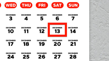 Close-up of the date December 13th marked with a red cursor on the wall calendar 2025