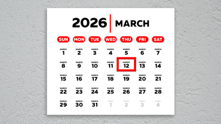 The date March 12th marked with a red cursor on the wall calendar 2026の写真素材