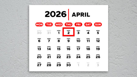 The date April 2nd marked with a red cursor on the wall calendar 2026