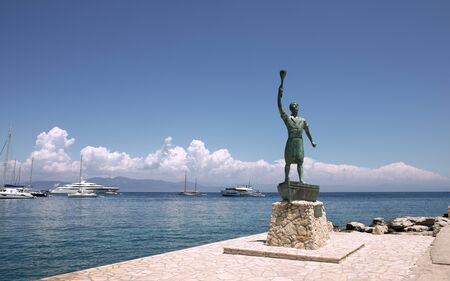 Port Gaios at Paxos Greek island in the Mediterranean sea: the Green Man monumentの写真素材
