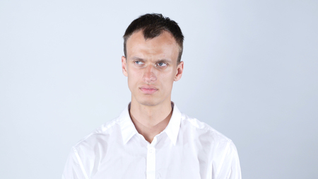 Confused and upset  businessman with sad  expressionの写真素材