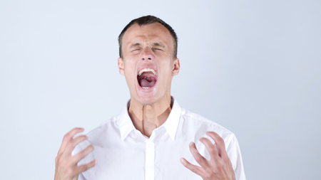 Close-up of angry businessman screamingの写真素材