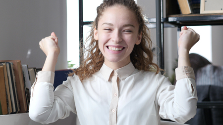 Success, Woman Cheering and Celebrating successful, Officeの写真素材