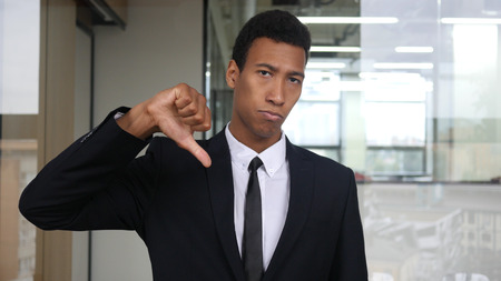 Thumb Down, Unsatisfied Black Businessmanの写真素材