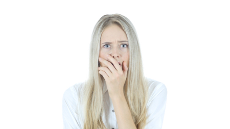 Shocking News Reaction by Woman, White Backgroundの写真素材