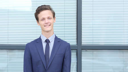Smiling Young Businessman, Outside Officeの写真素材
