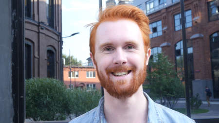 Smiling Man with Beard and Red Hairs, Outdoor Portraitの写真素材