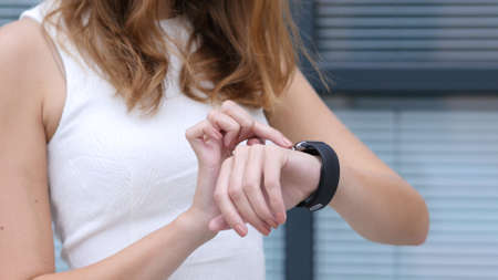 Close Up, Using Smartwatch by Beautiful Girl, Outside Office