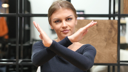 Crossing Hands for Rejection, Gesture of No by Girlの写真素材