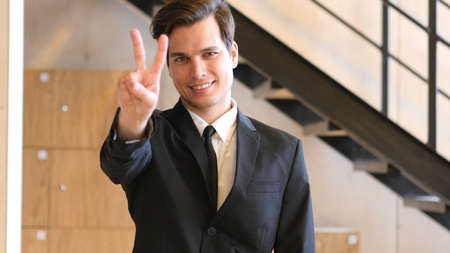 Sign of Victory by Businessman, Winnerの写真素材