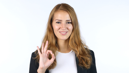 Businesswoman Showing Ok sign , All Is Okay , Portrait, White backgroundの写真素材