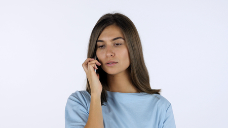 Talking Casually on Smartphone with Customersの写真素材