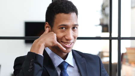 Call me Gesture by Black Businessman, Contact Usの写真素材