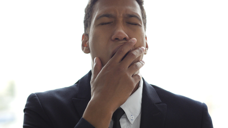 Yawning Sleepy Tired Black Businessmanの写真素材