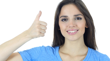 Thumbs Up By Young Woman, White Backgroundの写真素材
