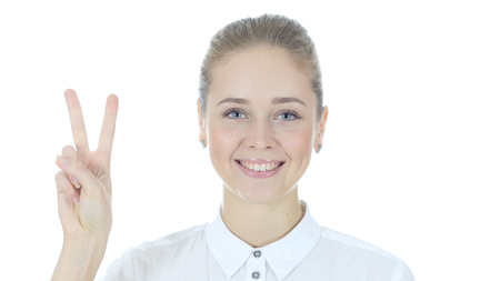 Woman Showing Victory Sign, White Backgroundの写真素材