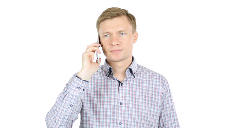 Serious Man talking on  Smartphoneの写真素材