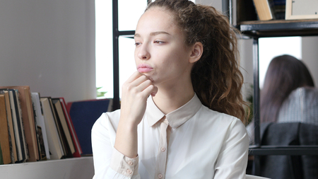 Thinking, Pensive Business Woman, Indoor Officeの写真素材