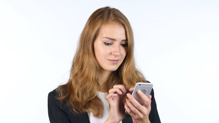 Businesswoman Using Smartphone , White backgroundの写真素材