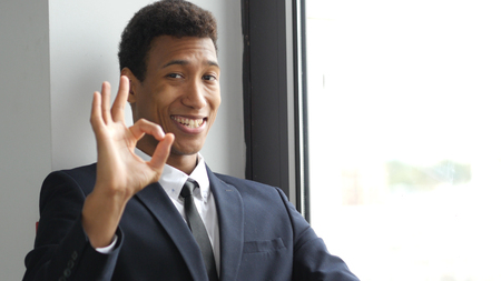 Sign of Okay, Gesture by Afro-American  Businessman in Suit, Satisfactionの写真素材