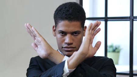 Rejecting, Cross Hands Gesture by Black Businessman