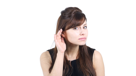 Girl Listening Secret Carefully, White Backgroundの写真素材