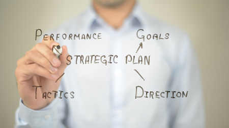 Strategic Plan Illustration, man writing on transparent screenの写真素材