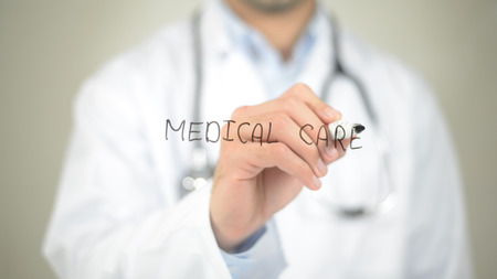 Medical Care, Doctor writing on transparent screenの写真素材