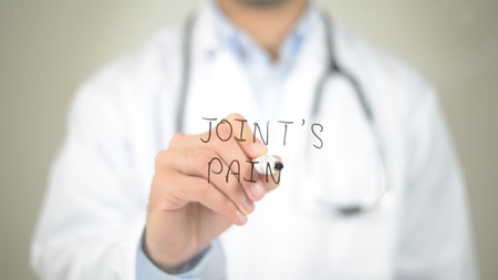 Joint's Pain, Doctor writing on transparent screenの写真素材