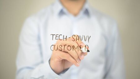 Tech Savvy Customer, Man Writing on Transparent Screenの写真素材