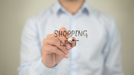 Shopping List , man writing on transparent screenの写真素材