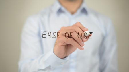 Ease To Use , man writing on transparent screenの写真素材