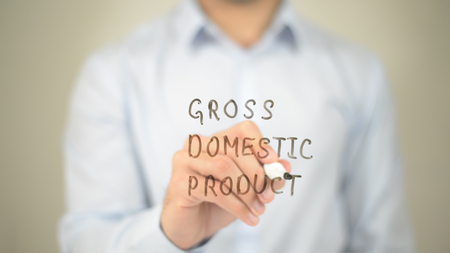 Gross Domestic Product, GDP,  Man writing on transparent screenの写真素材