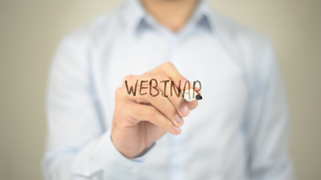 Webinar,  Man writing on transparent screenの写真素材