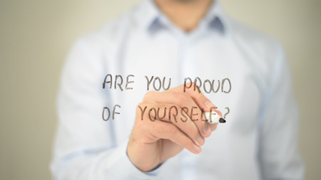 Are You Proud Of Yourself , man writing on transparent screenの写真素材