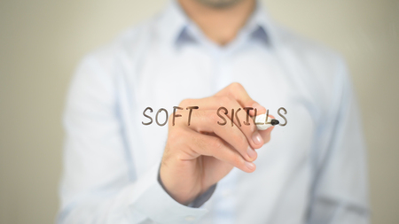 Soft Skills   ,  man writing on transparent wallの写真素材