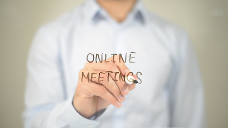 Online Meeting , Man writing on transparent screenの写真素材