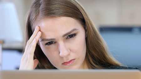 Tired Woman at Work, Headacheの写真素材