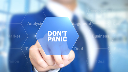 Don't Panic, Businessman working on holographic interface, Motion Graphicsの写真素材