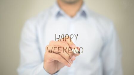Happy Weekend, man writing on transparent screenの写真素材
