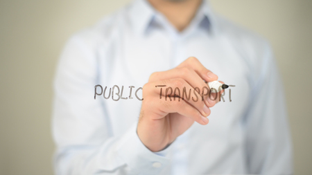 Public Transport , man writing on transparent screenの写真素材