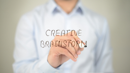 Creative Brainstorm, man writing on transparent screenの写真素材