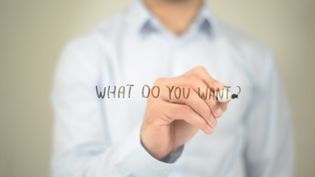 What Do You Want, Man Writing on Transparent Screenの写真素材