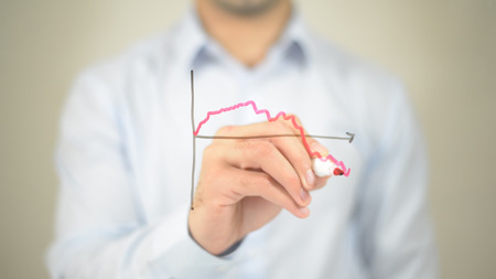 Stock Market Graph Concept,  Man writing on transparent screenの写真素材